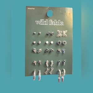 15 Pairs of Silver Toned Earrings